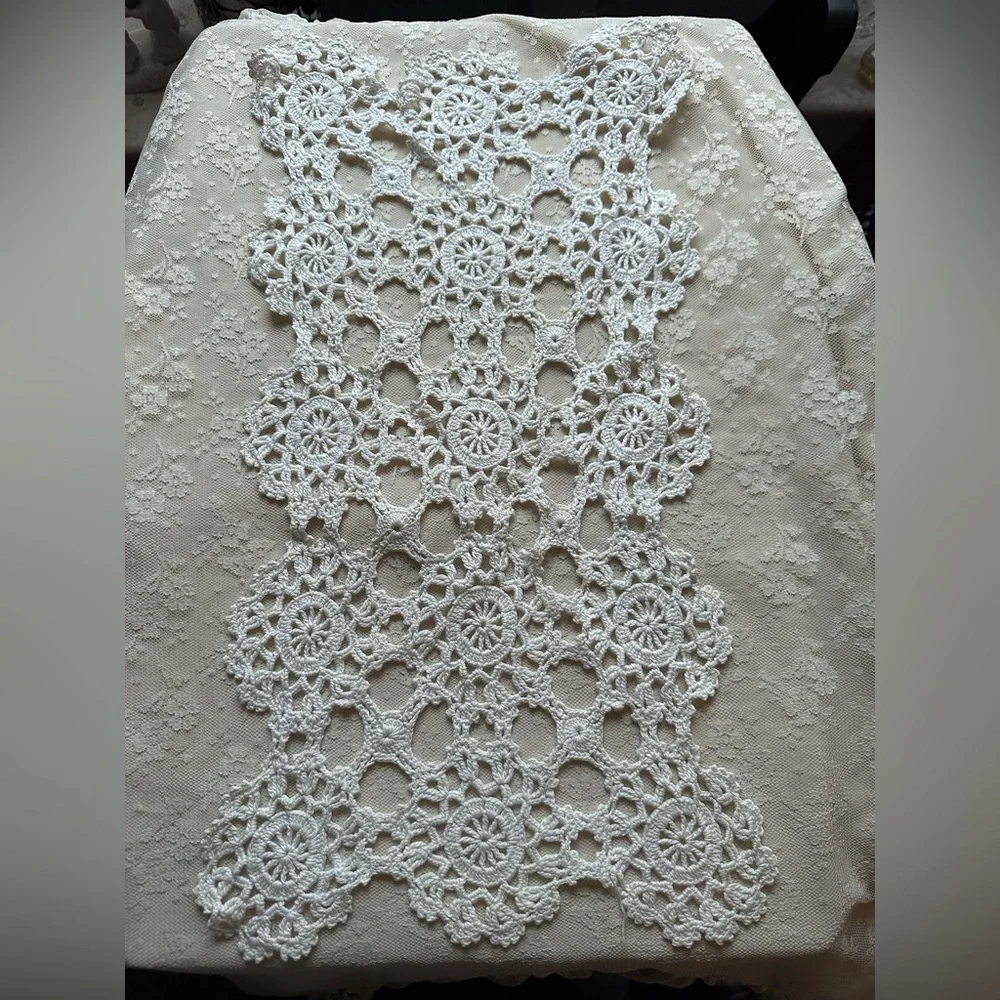 Lot of two table doilies 10 x 18 each